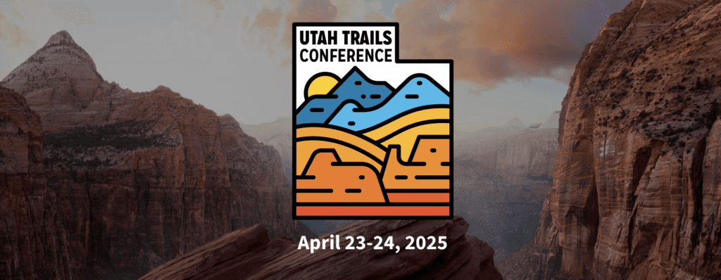 Logo for the Utah Trails Conference, set against a mountainous landscape, with dates April 23-24, 2025.