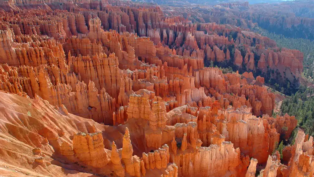 A vast landscape of orange hoodoos and rocky formations at Bryce Canyon.