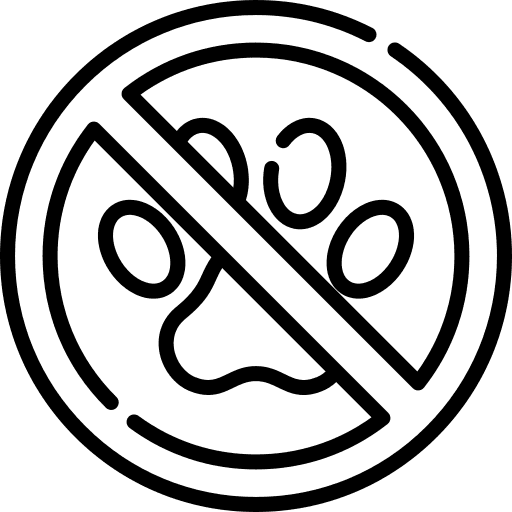 A simple black silhouette of a cat sitting.