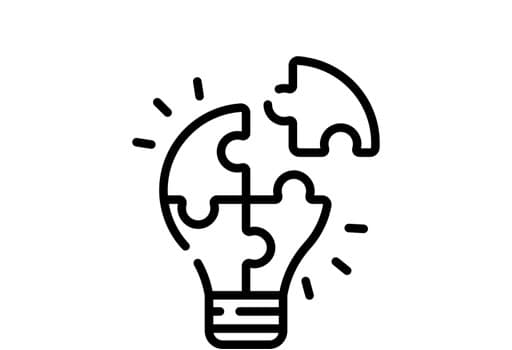 A light bulb made of puzzle pieces.