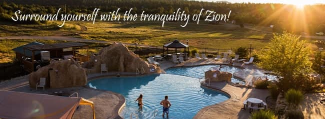 A serene pool area at sunset surrounded by nature, inviting relaxation.