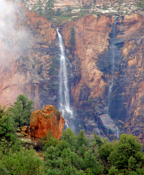 Waterfalls stream from canyon walls in Zion National Park