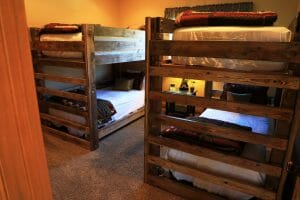 2 bunk beds inside of a vacation home at Zion Ponderosa Ranch