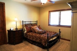 a full sized bed in a spacious room in a vacation home near Zion national park