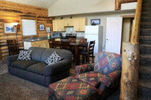 an open kitchen and living room in a cabin at zion ponderosa ranch