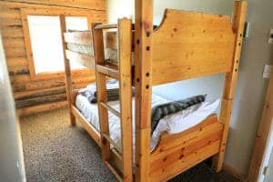 a bunk bed in a cabin at zion ponderosa ranch