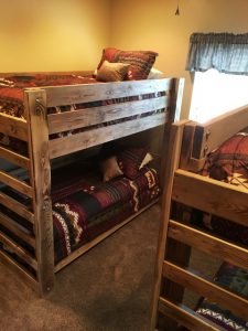 a bunk bed in a vacation home at zion ponderosa ranch