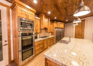 A clean kitchen with a lot of counter space in a rental home near Zion National Park