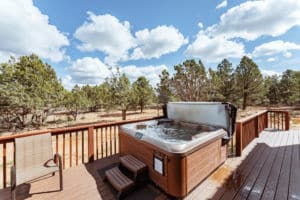 Zion Ponderosa hot tub on porch of mountain vacation home overlooking Zion National Park