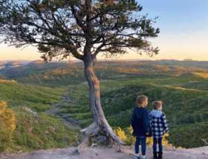 Two children overlooking Pine Knoll at Zion Ponderosa Ranch Resort