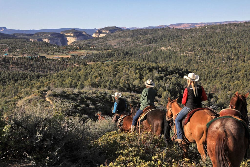 A family experiencing Zion Ponderosa’s horseback riding trails and tours