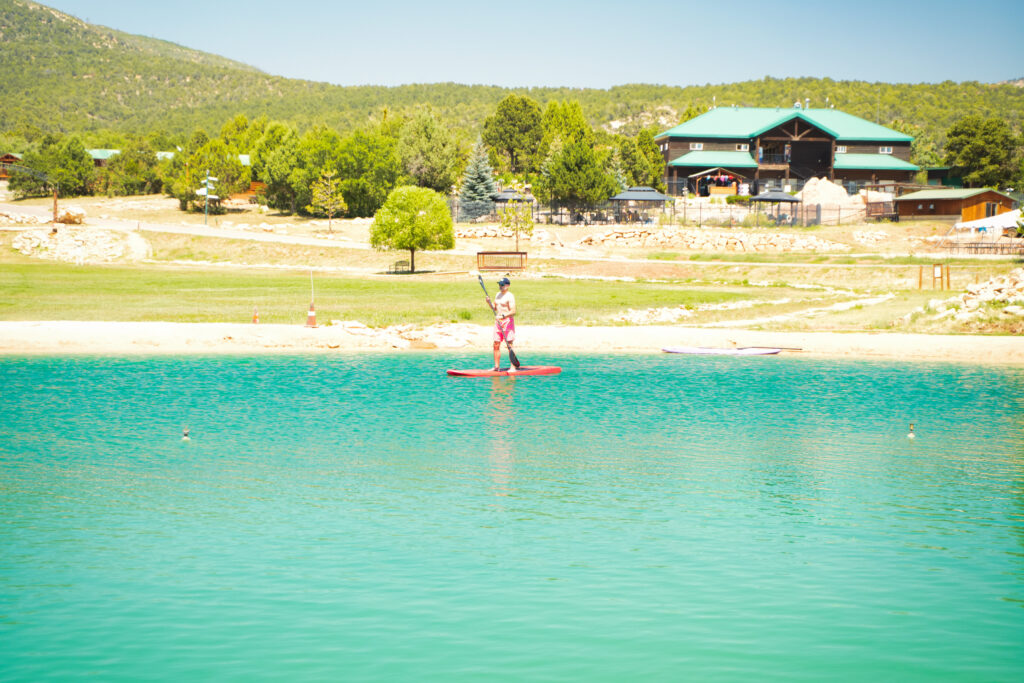 A man paddleboarding